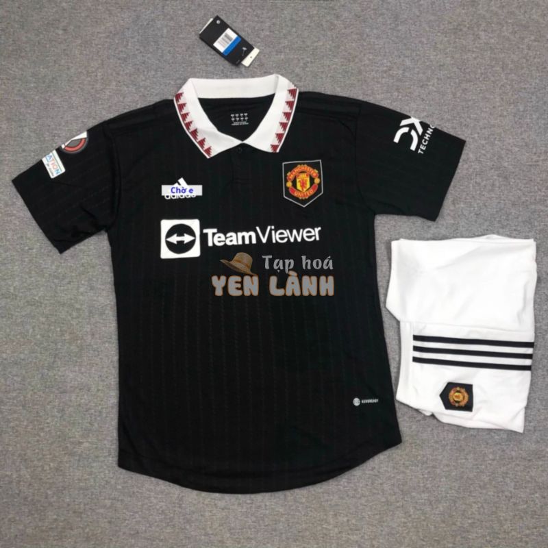 Bộ quần áo đá banh clb MU jersey 2022 2023 màu đen black có cổ bản đấu cúp C2 sẵn bage tay gai thái