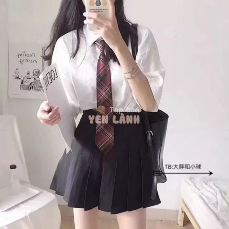 Áo sơ mi cà vạt rất xinh kết hợp chân váy xếp ly cực đẹp.hợp với phong cách xi teen .đi học đi chơi đều rất đẹp nhé.