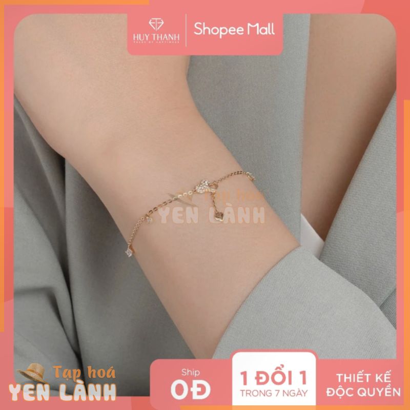 Lắc Tay Vàng Vàng 14K Thiết Kế Họa Tiết Trái Tim Dáng Rơi Đính Đá CZ Cao Cấp Lấp Lánh LLF240 Huy Thanh Jewelry