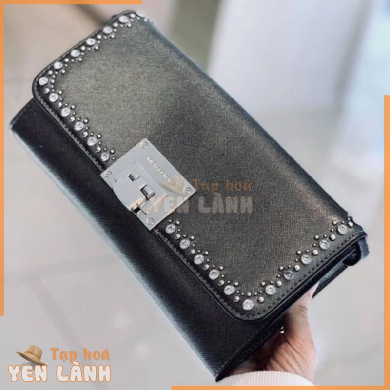 Túi MK tina clutch viền đá