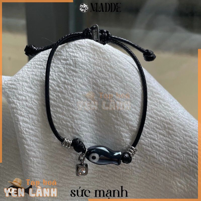 vòng tay con cá mắt quỷ sứ may mắn với charm thép không teng gỉ Madde